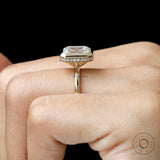 emerald cut lab diamond bezel halo ring yellow gold