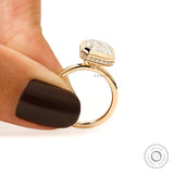 emerald cut lab diamond bezel halo ring elegant side view