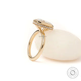 minimalist emerald cut bezel set engagement ring yellow gold
