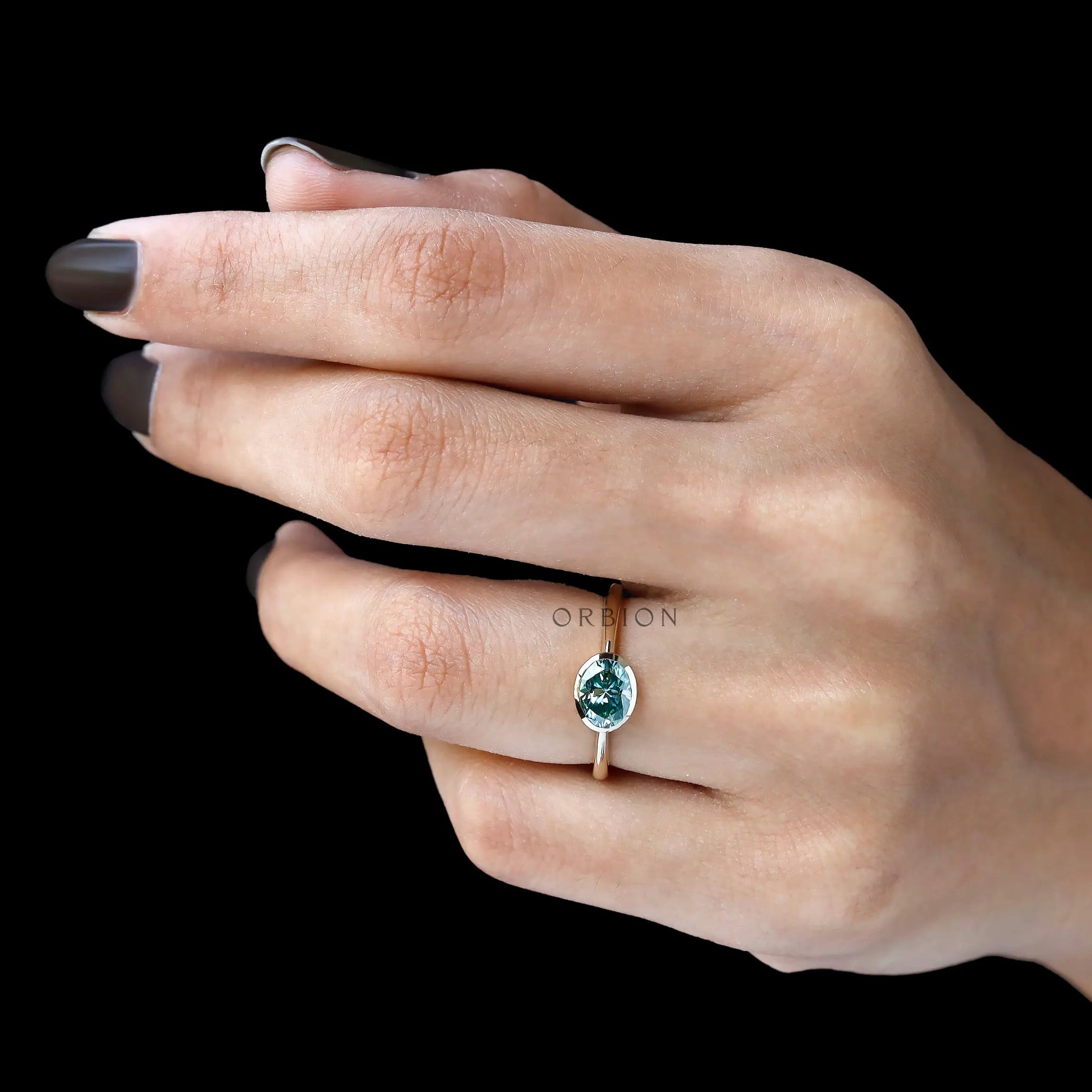 Dainty oval moissanite bezel solitaire ring elegant design