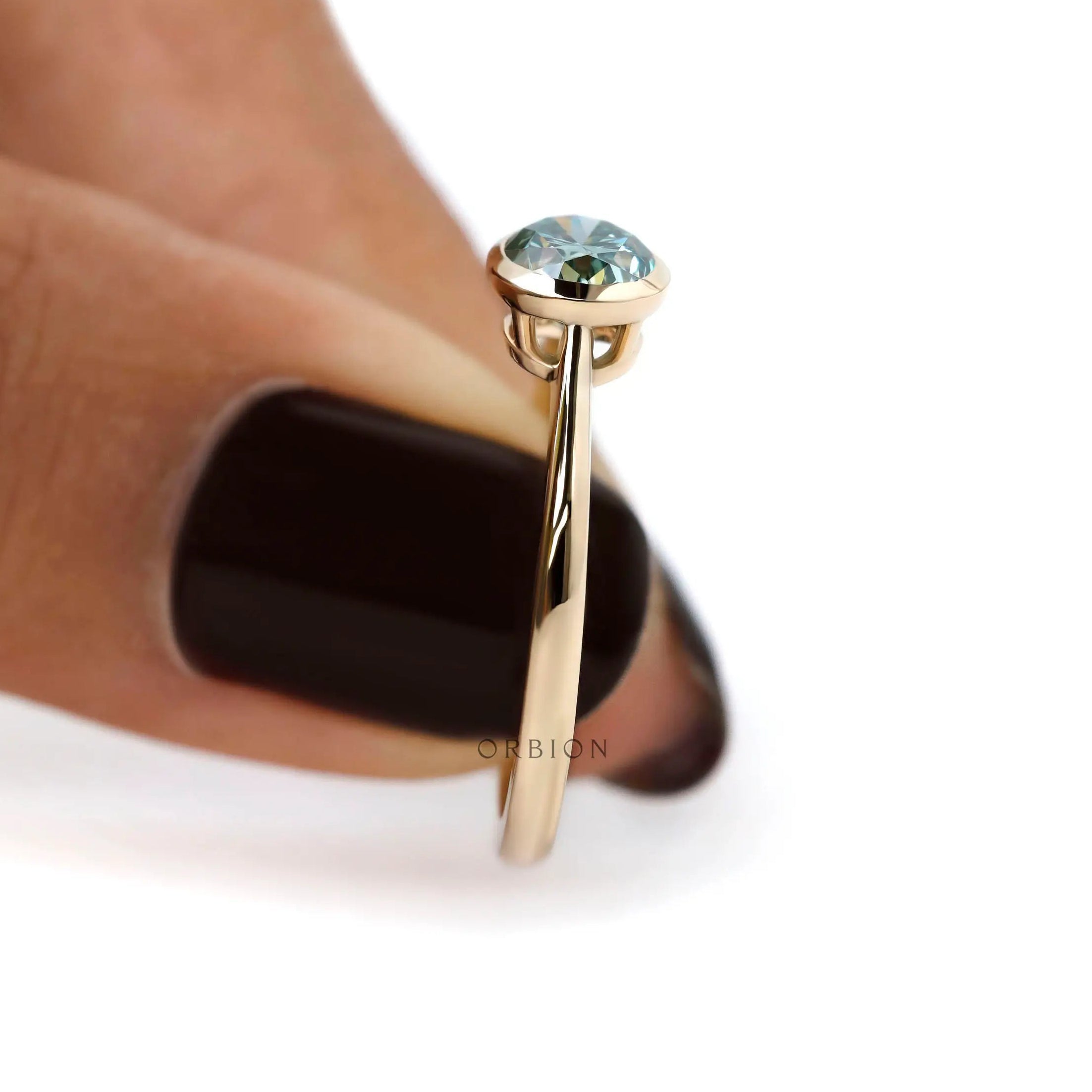 Modern east west oval moissanite solitaire ring 10k yellow gold