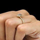 Oval champagne moissanite half bezel engagement ring in 14k yellow gold
