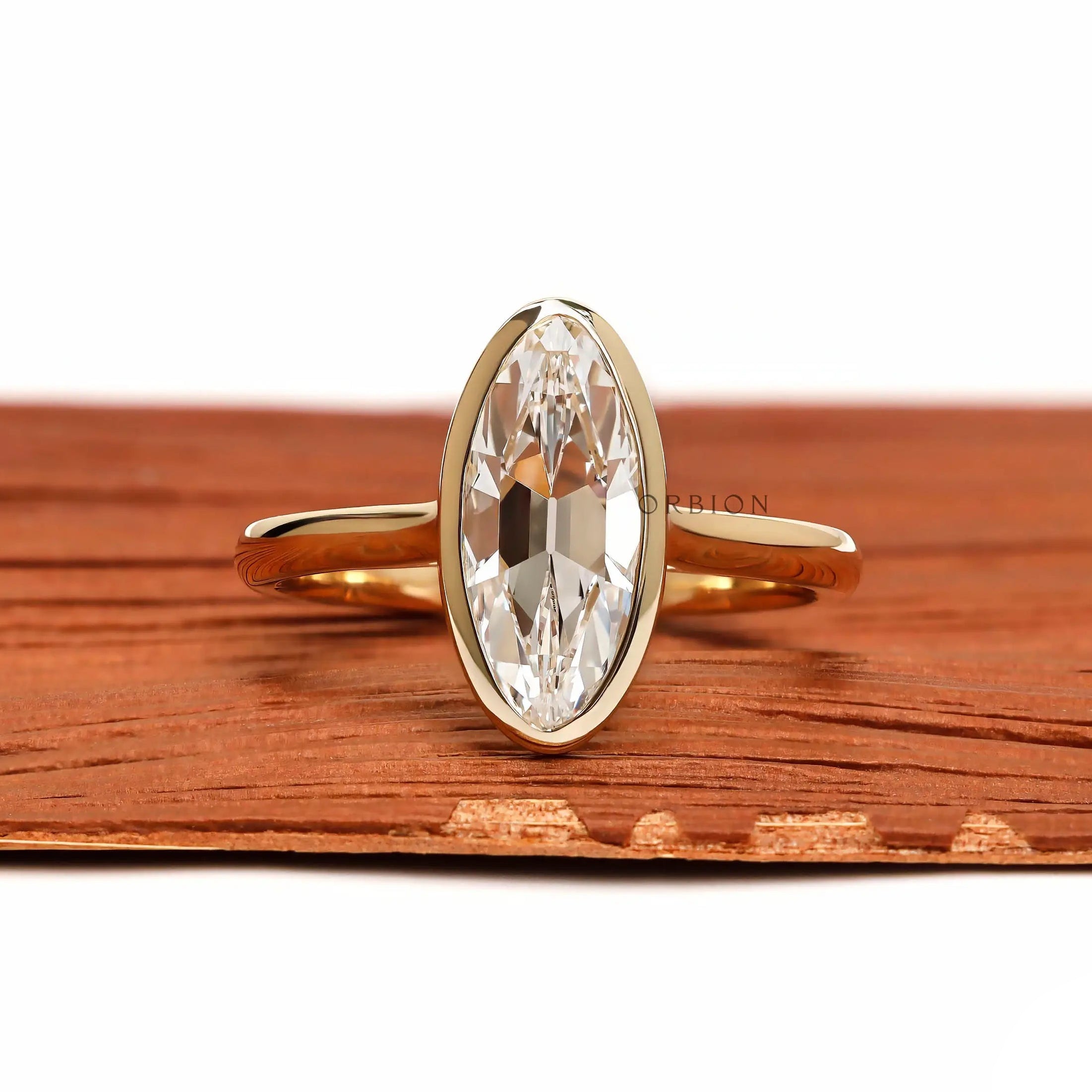 Antique OMC moval lab diamond bezel solitaire ring front view