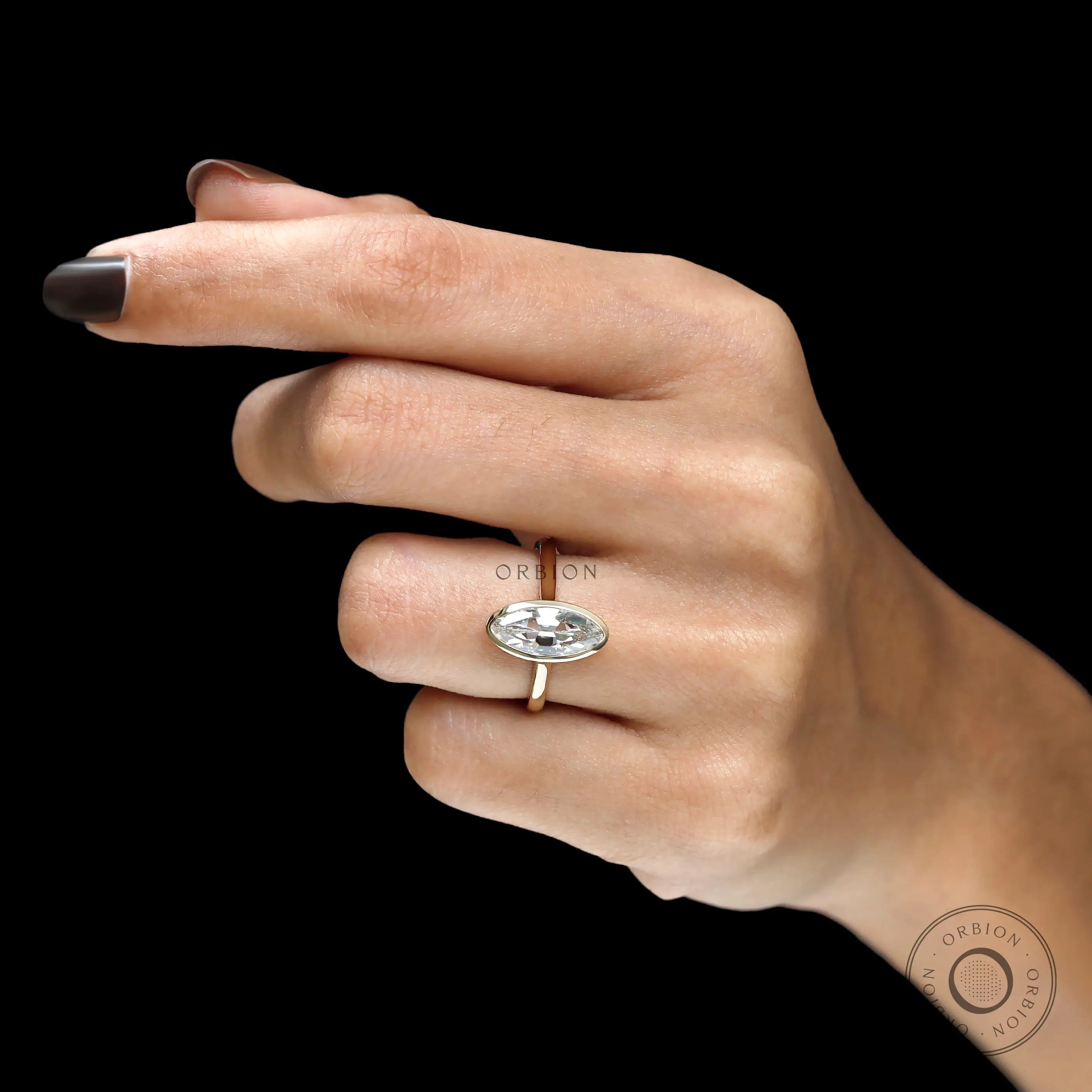 Hand shot antique OMC moval bezel set diamond ring