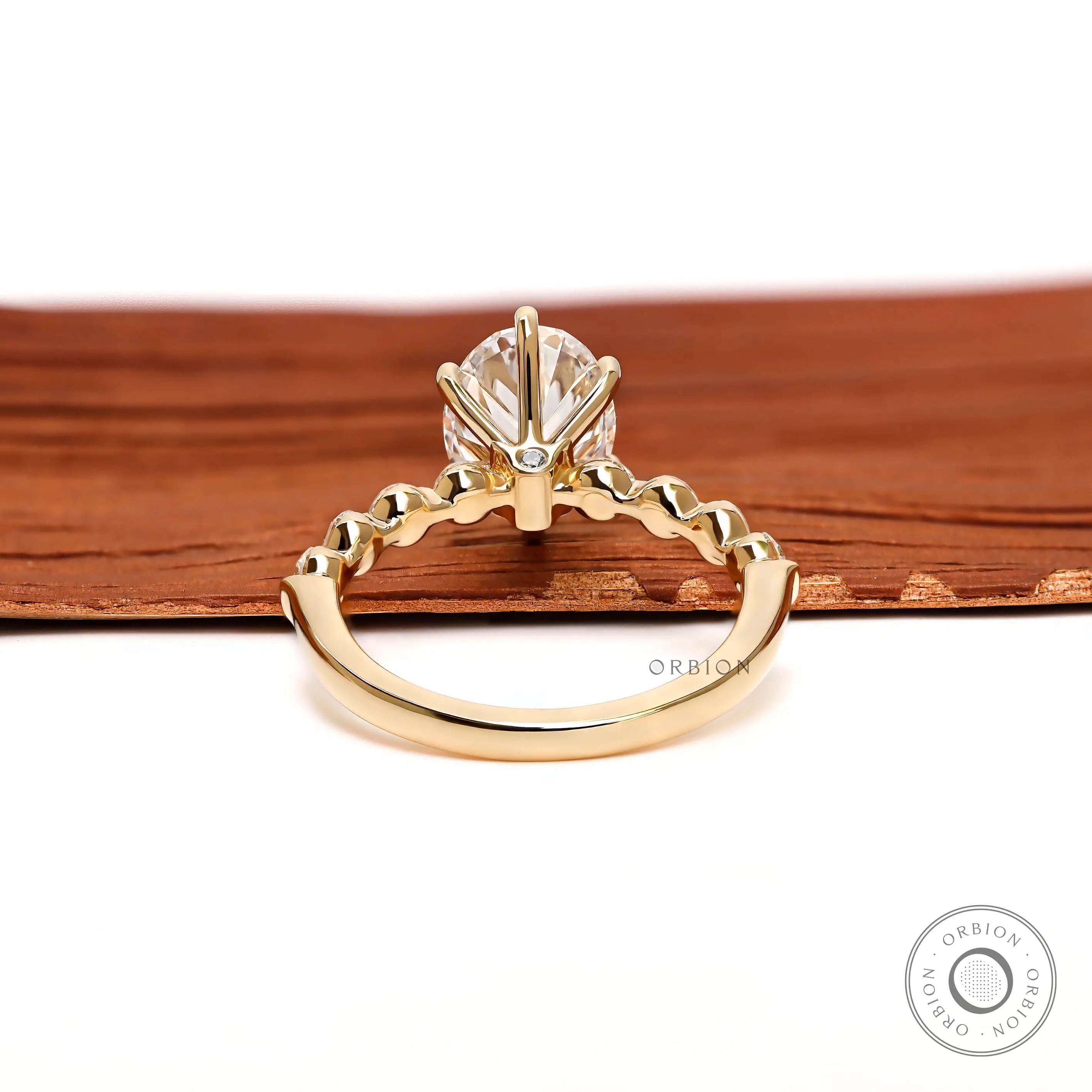 Back gallery view oval diamond ring with hidden accent