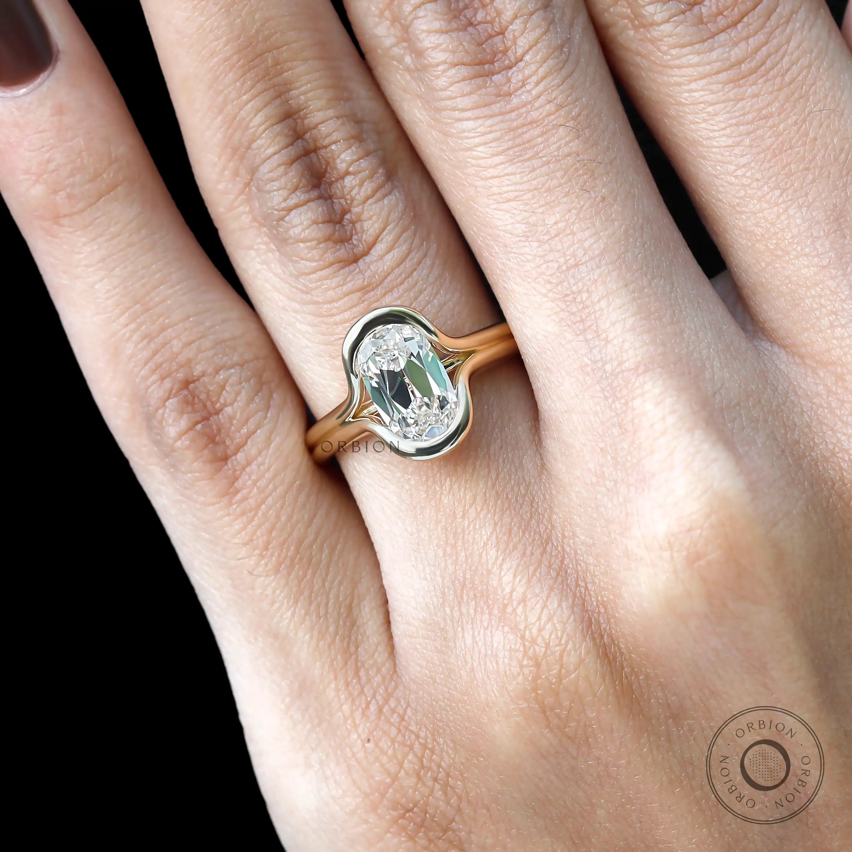 Top hand view elongated cushion lab diamond engagement ring