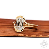 Angled front view floating elongated cushion lab diamond ring