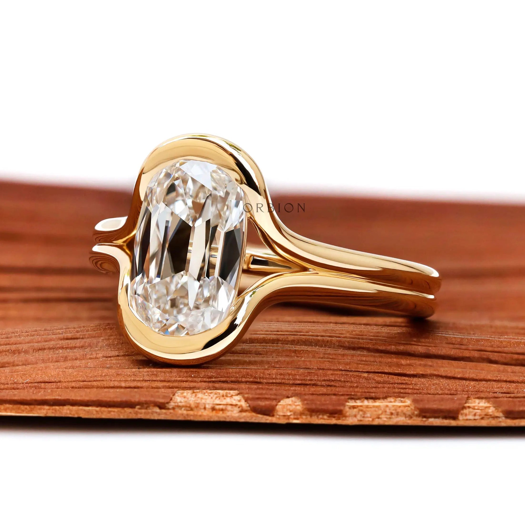 Angled front view floating elongated cushion lab diamond ring