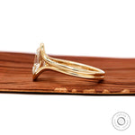 Side profile elongated cushion lab diamond ring in yellow gold