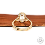 Rear view floating split shank engagement ring with open gallery