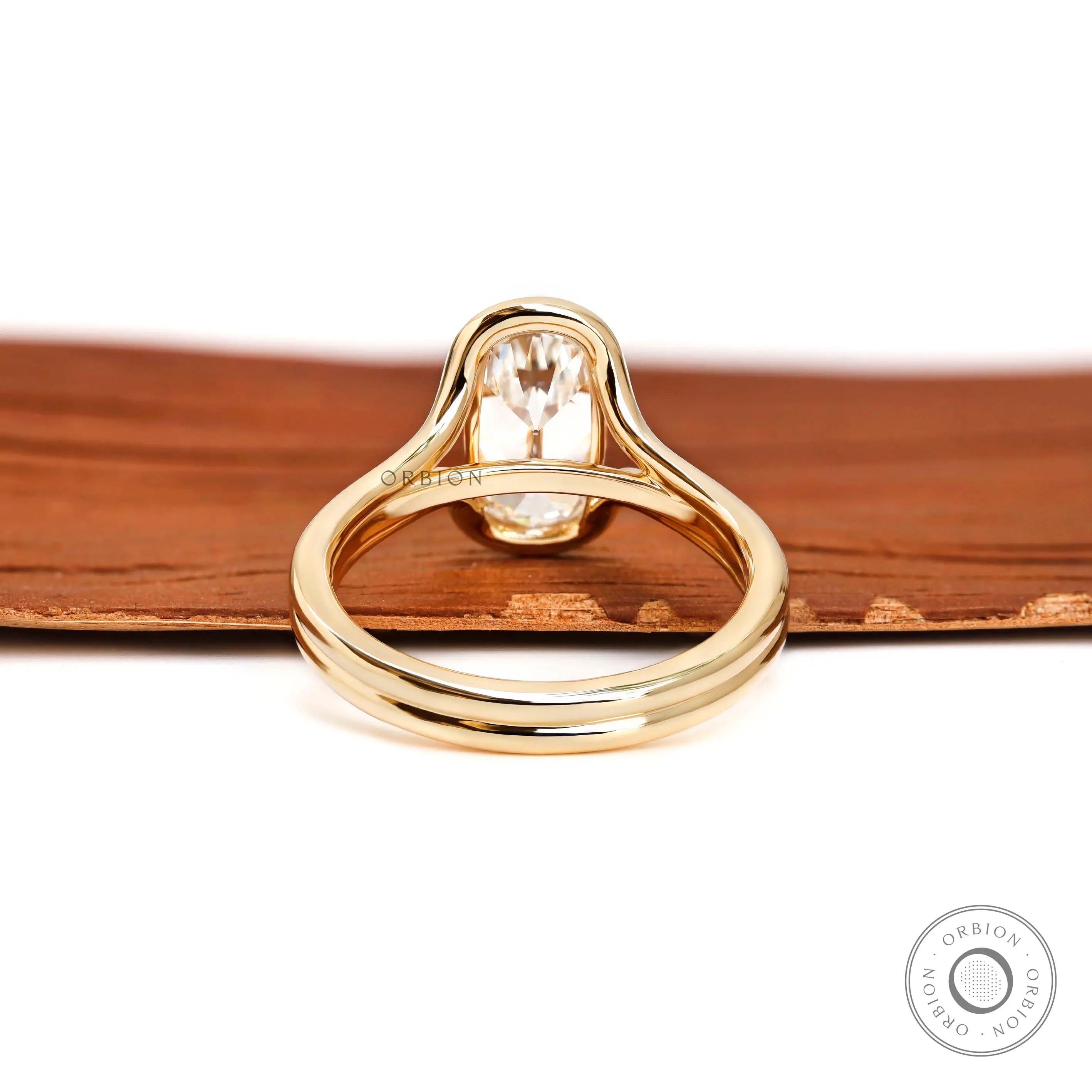 Rear view floating split shank engagement ring with open gallery