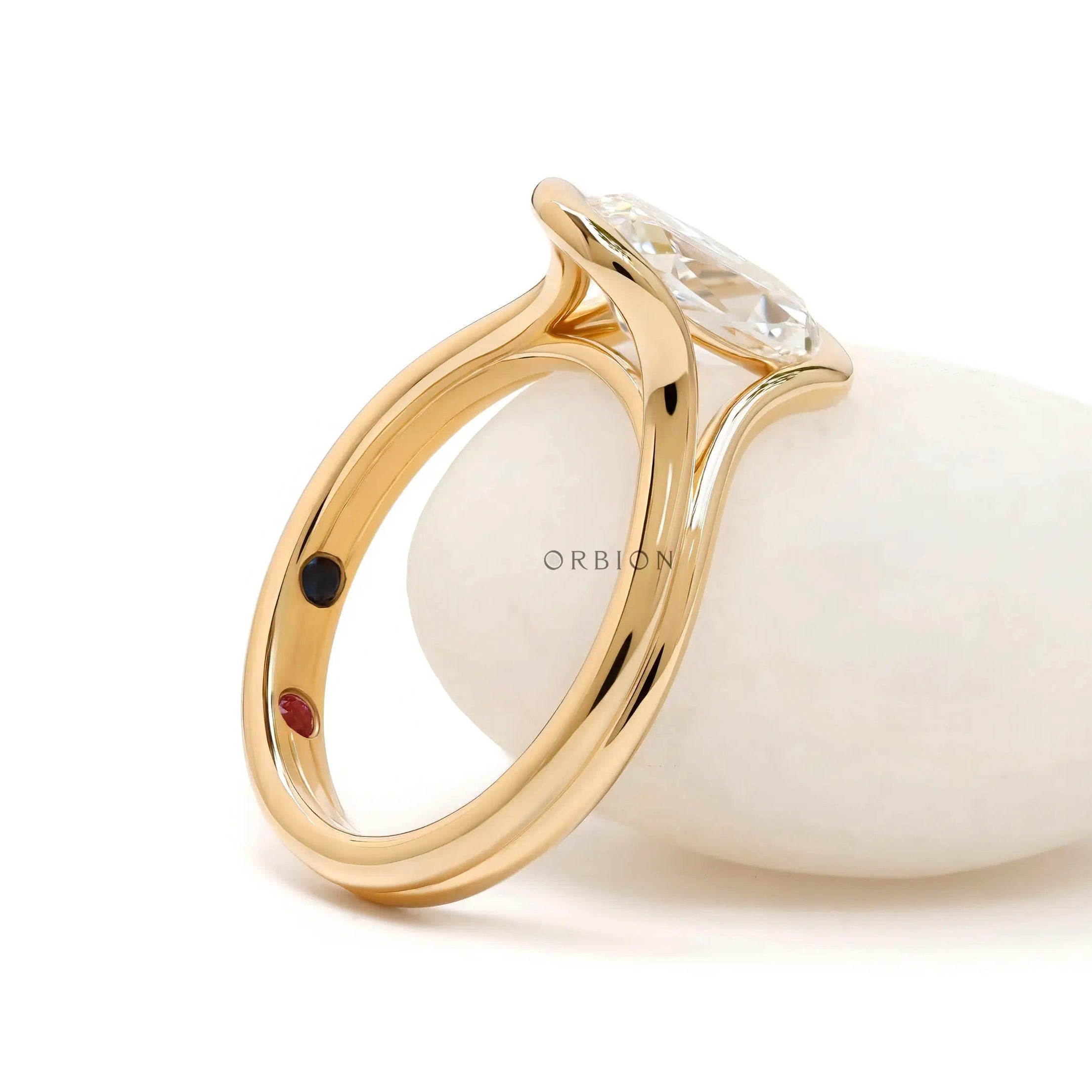 Side display view elongated cushion ring on white prop