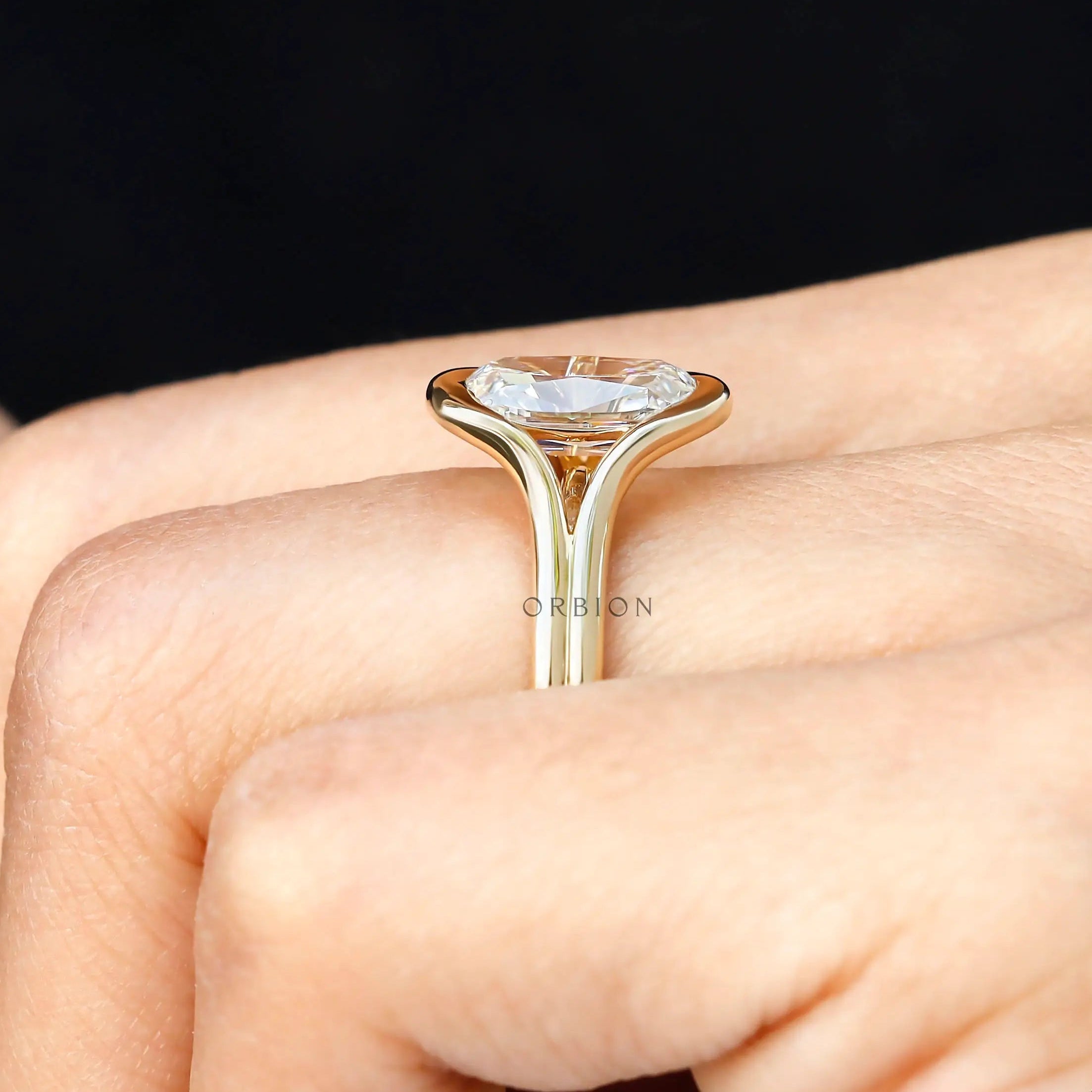 Close hand view old mine elongated cushion diamond ring