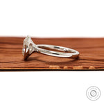 Side profile floating bezel round diamond solitaire ring in white gold