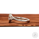Side profile floating bezel round diamond solitaire ring in white gold