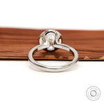 Back view open gallery floating bezel round diamond ring