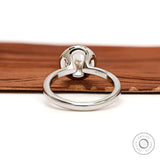 Back view open gallery floating bezel round diamond ring