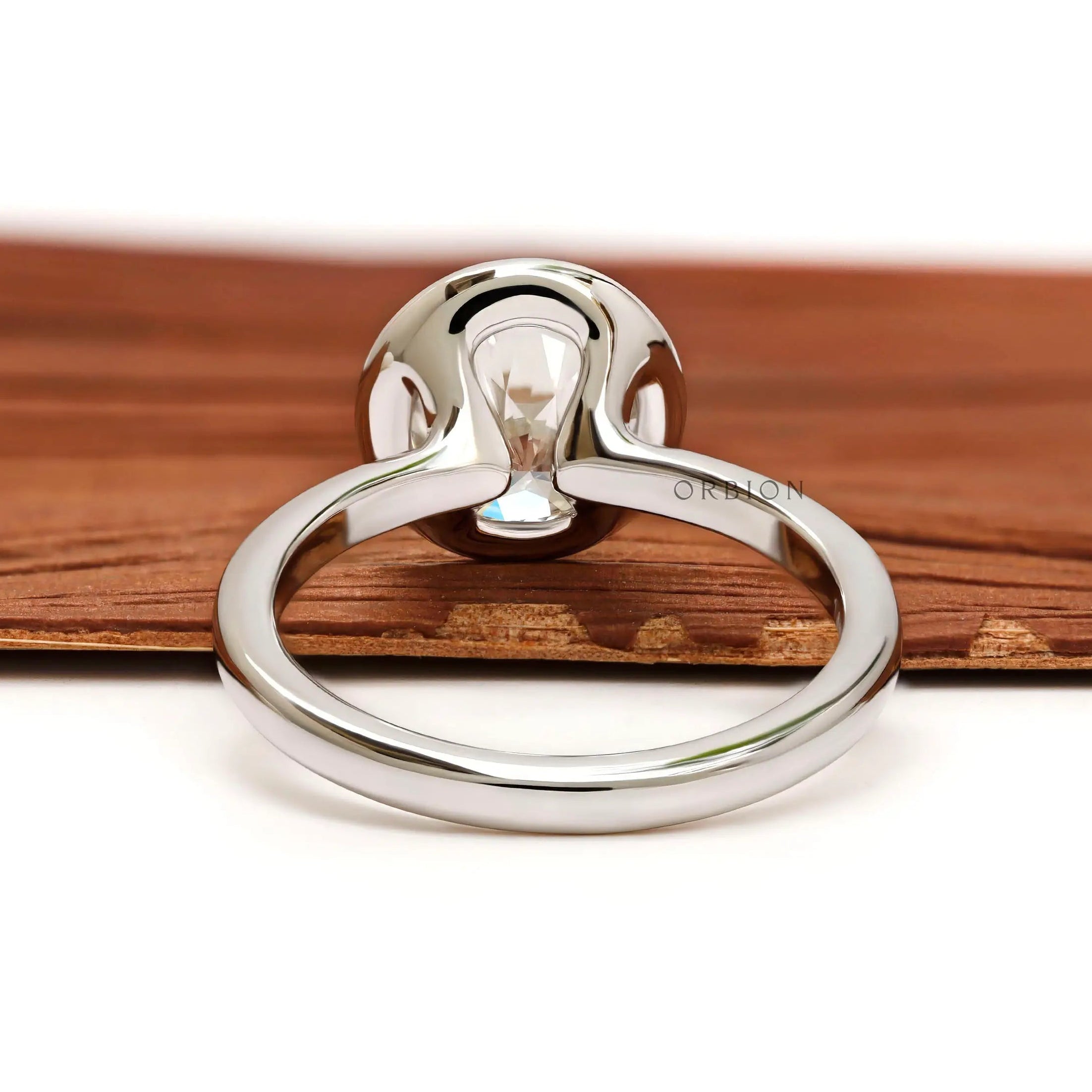 Back view open gallery floating bezel round diamond ring
