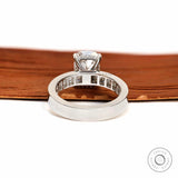 Back perspective revealing open gallery beneath elongated cushion diamond.