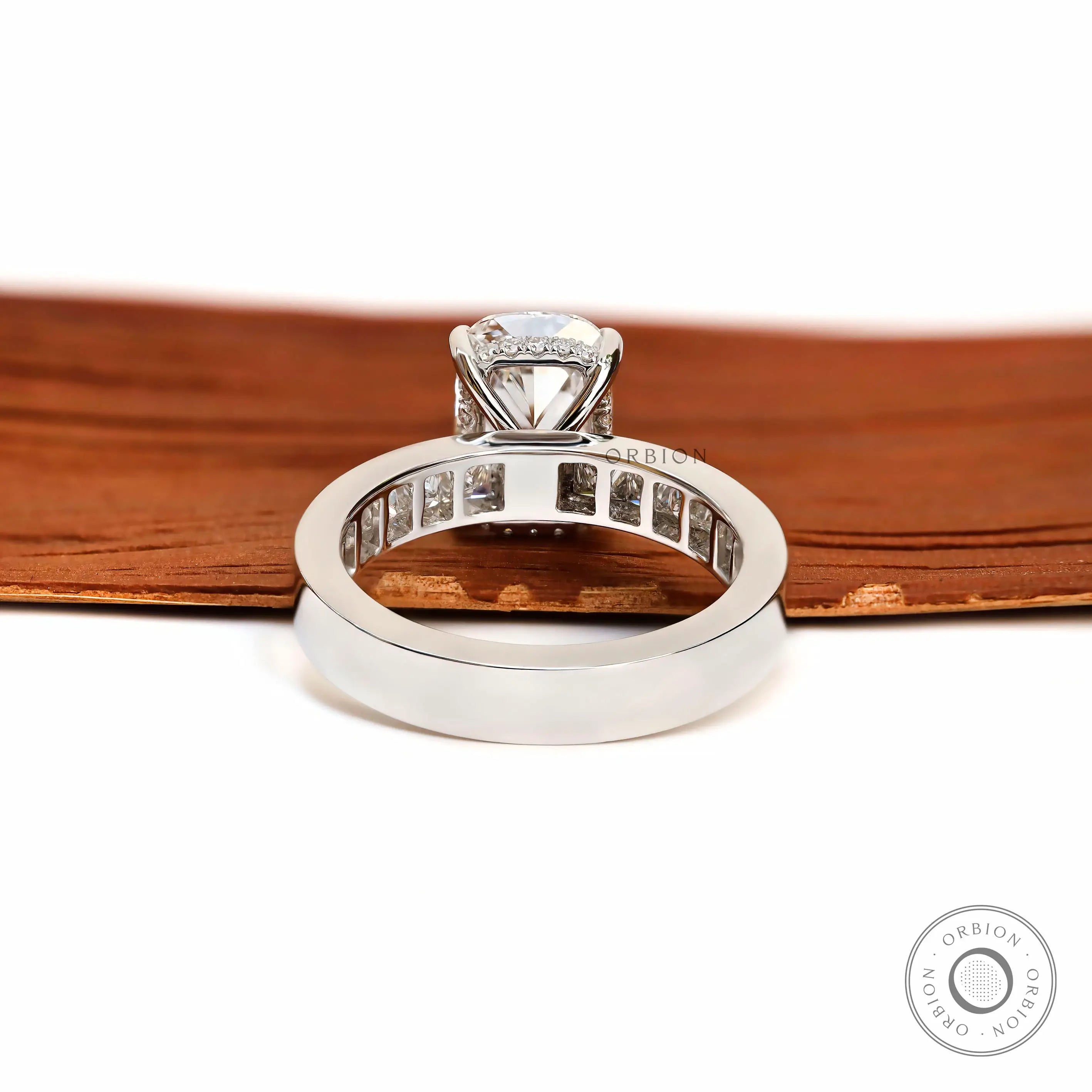 Back perspective revealing open gallery beneath elongated cushion diamond.