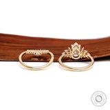 Back view of pear moissanite ring set in yellow gold