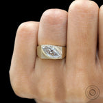 Bold signet style engagement ring with marquise moissanite