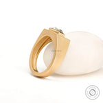 High polish yellow gold signet ring detail