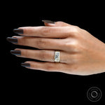 Marquise moissanite signet ring worn on hand