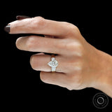 Lifestyle hand shot pear diamond ring with baguette sides