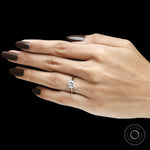 Stackable platinum engagement ring with 2 Ct cushion cut gemstone, hidden halo and elegant bridal style