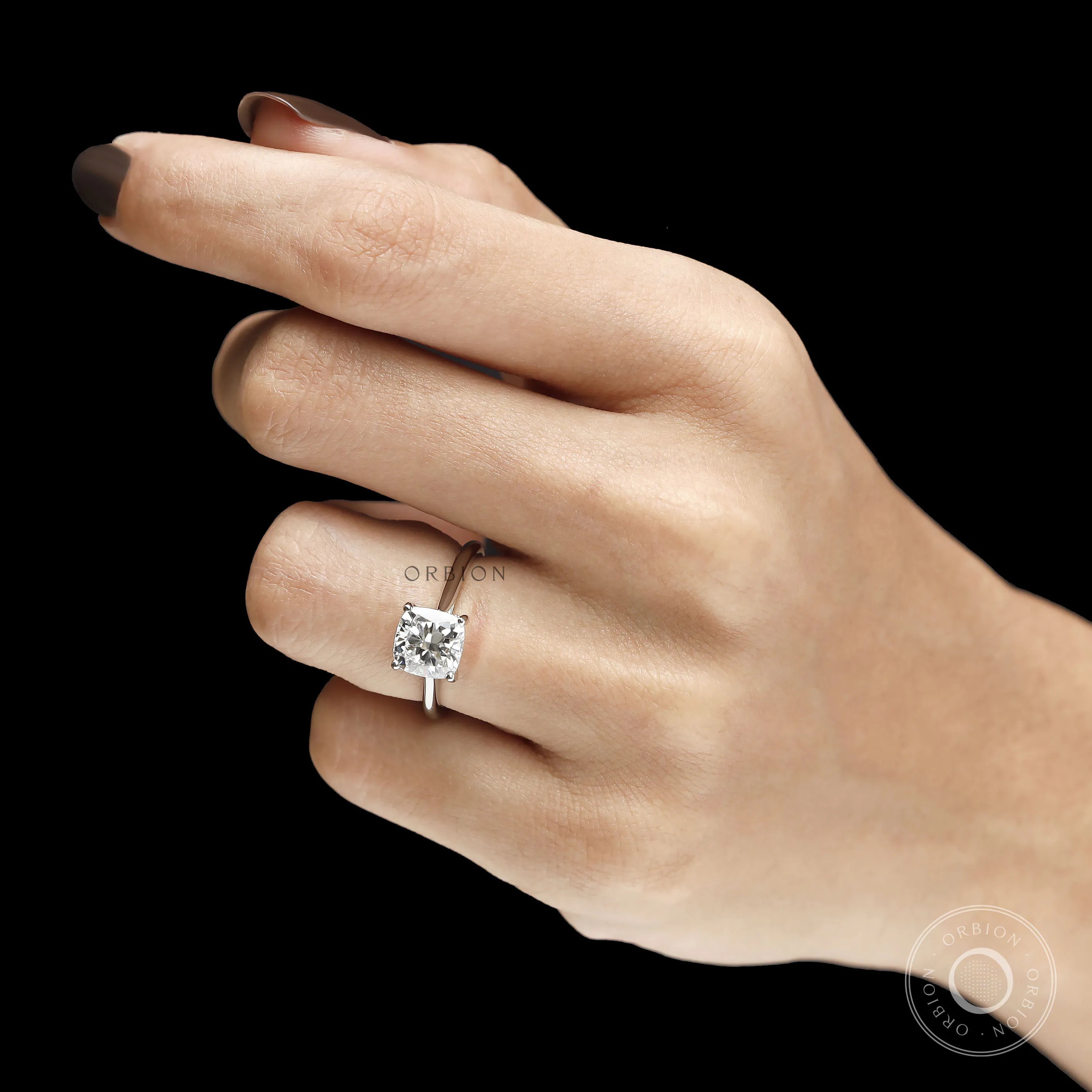 Classic platinum cushion engagement ring featuring lab grown diamond or moissanite center stone 