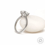 Cushion cut lab grown diamond engagement ring with hidden halo and platinum cathedral setting for women
