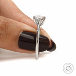 Luxury platinum wedding ring featuring cushion cut lab diamond or moissanite with cathedral solitaire setting