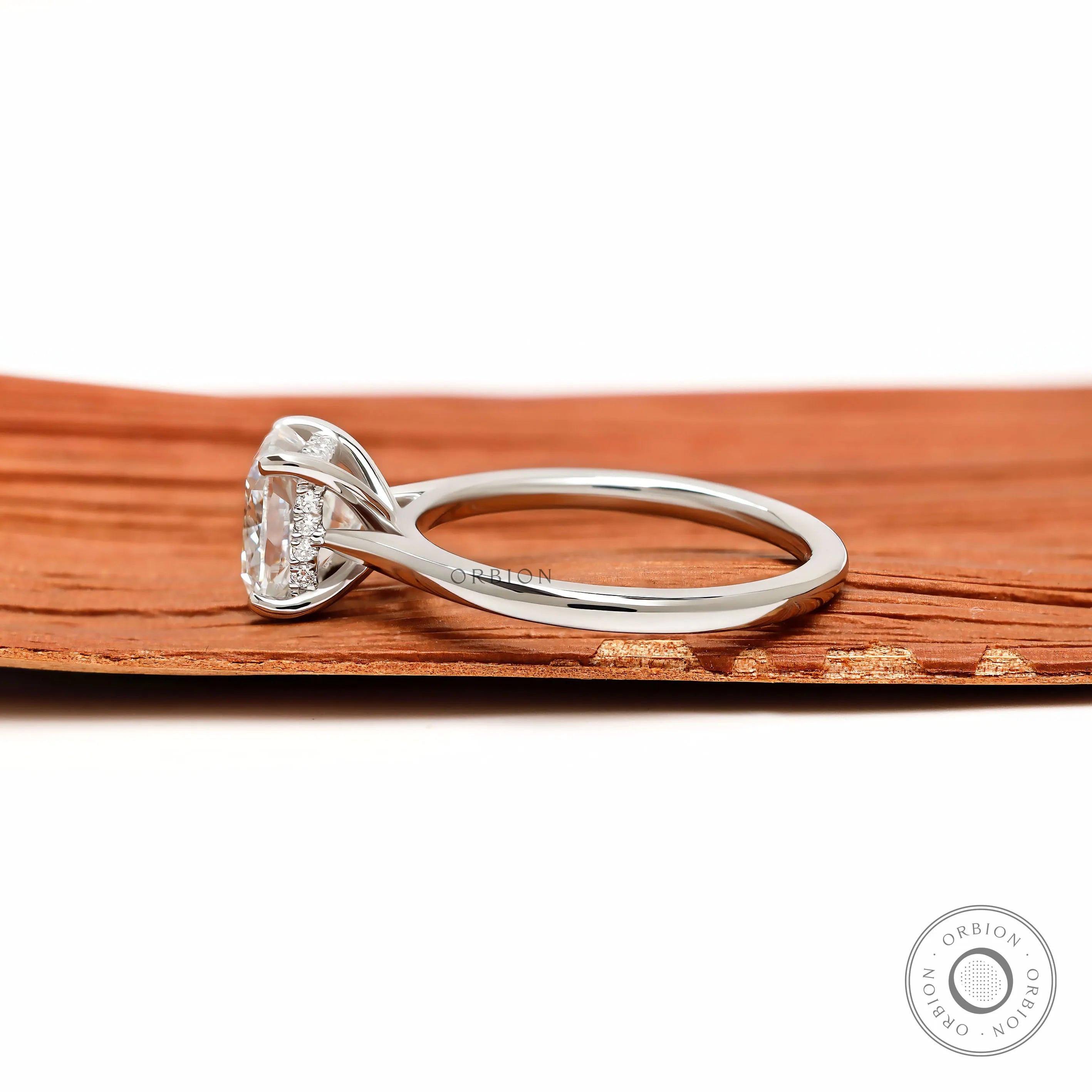 Elegant 2 carat cushion solitaire engagement ring with cathedral setting 