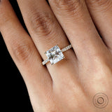 Yellow gold asscher step cut solitaire engagement ring close up