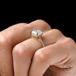 Classic asscher cut cathedral engagement ring with diamond halo