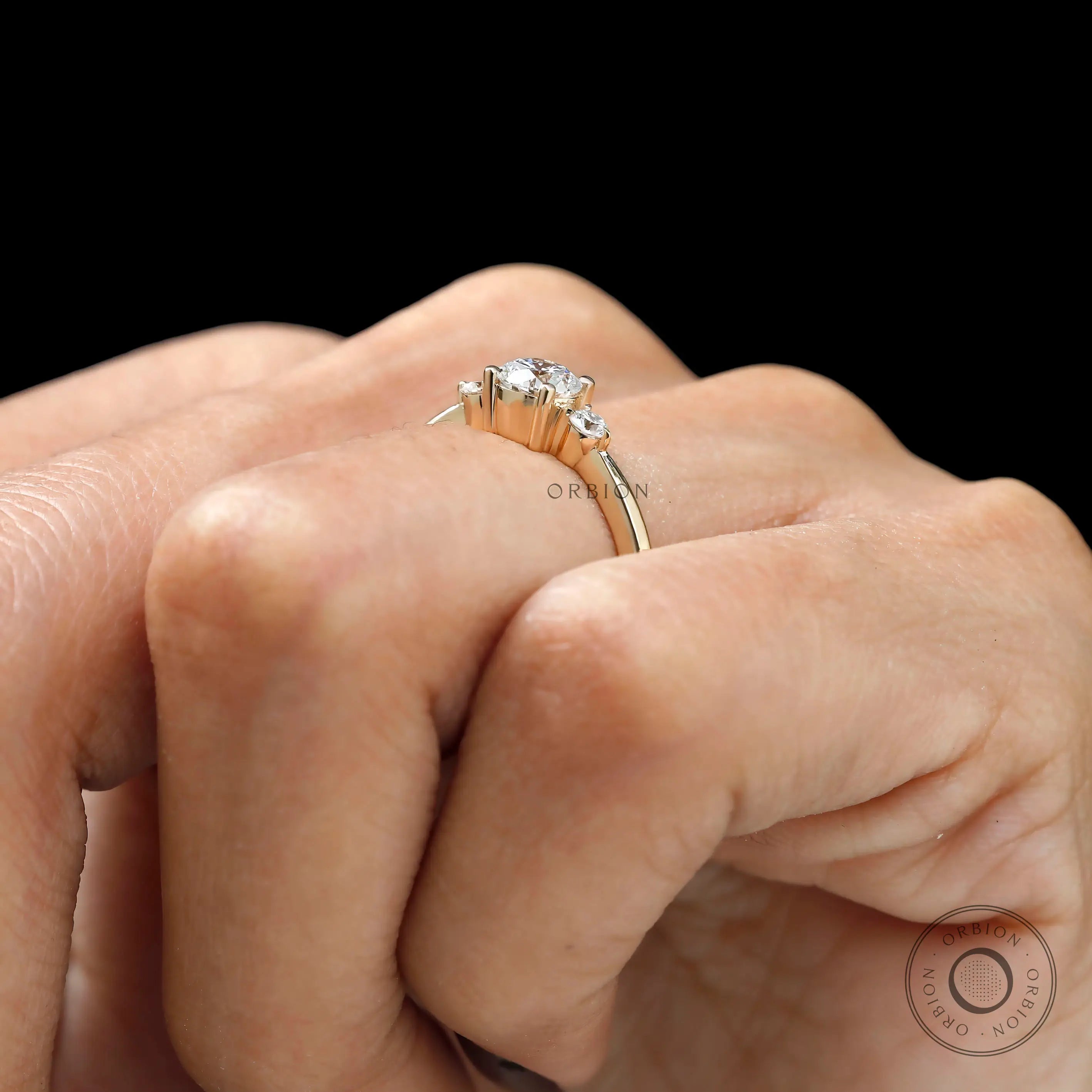Minimalist round cut three stone diamond ring in 10k yellow gold