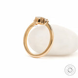 Fine jewelry oval engagement ring with slim yellow gold shank