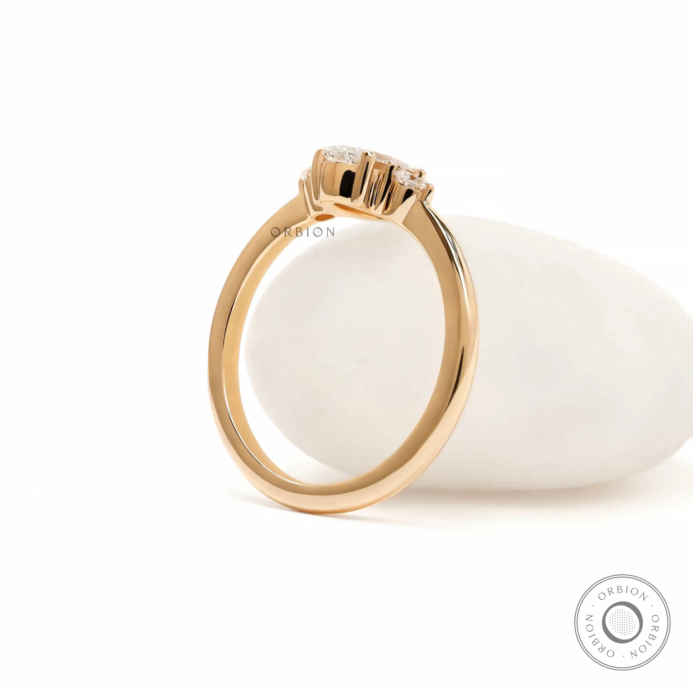 Fine jewelry oval engagement ring with slim yellow gold shank