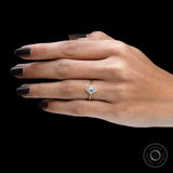 Yellow gold marquise ring with geometric side stones