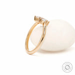Glossy 10k yellow gold marquise trilogy  engagement ring