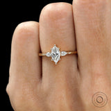 Prong setting detail of marquise cut lab diamond ring solid gold