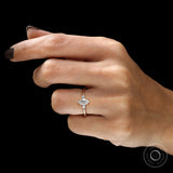 Elegant marquise and pear lab diamond ring on finger