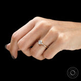 Oval lab diamond ring on finger lifestyle image