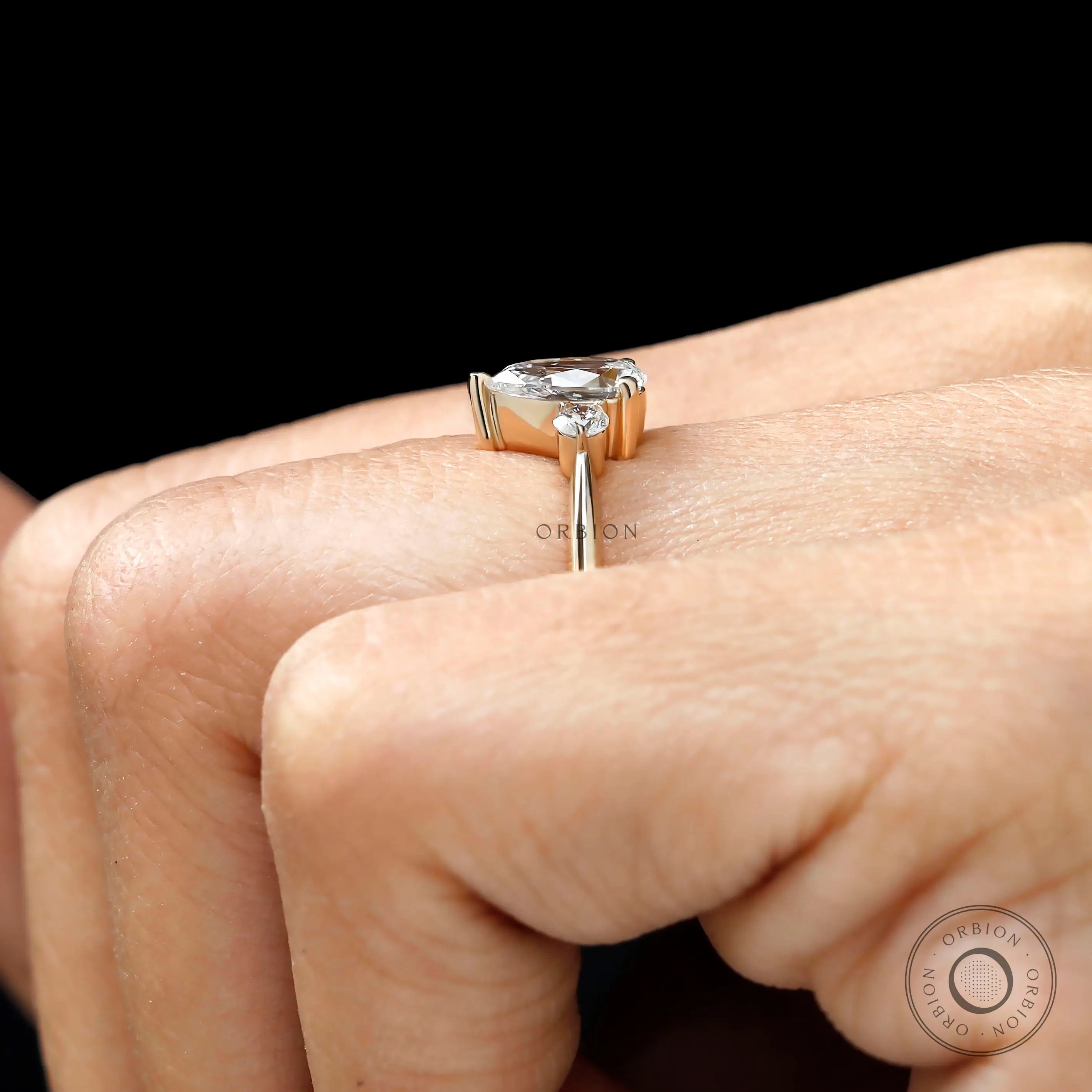 Classic three stone engagement ring in 10k yellow gold