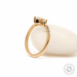 Moissanite pear and round three stone ring glossy finish