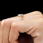 Lab grown diamond pear engagement ring with delicate setting