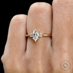 Marquise and round cut three stone lab diamond ring in 10k yellow gold