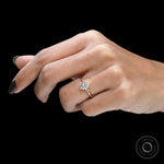 Hand worn marquise and round diamond three stone ring in yellow gold