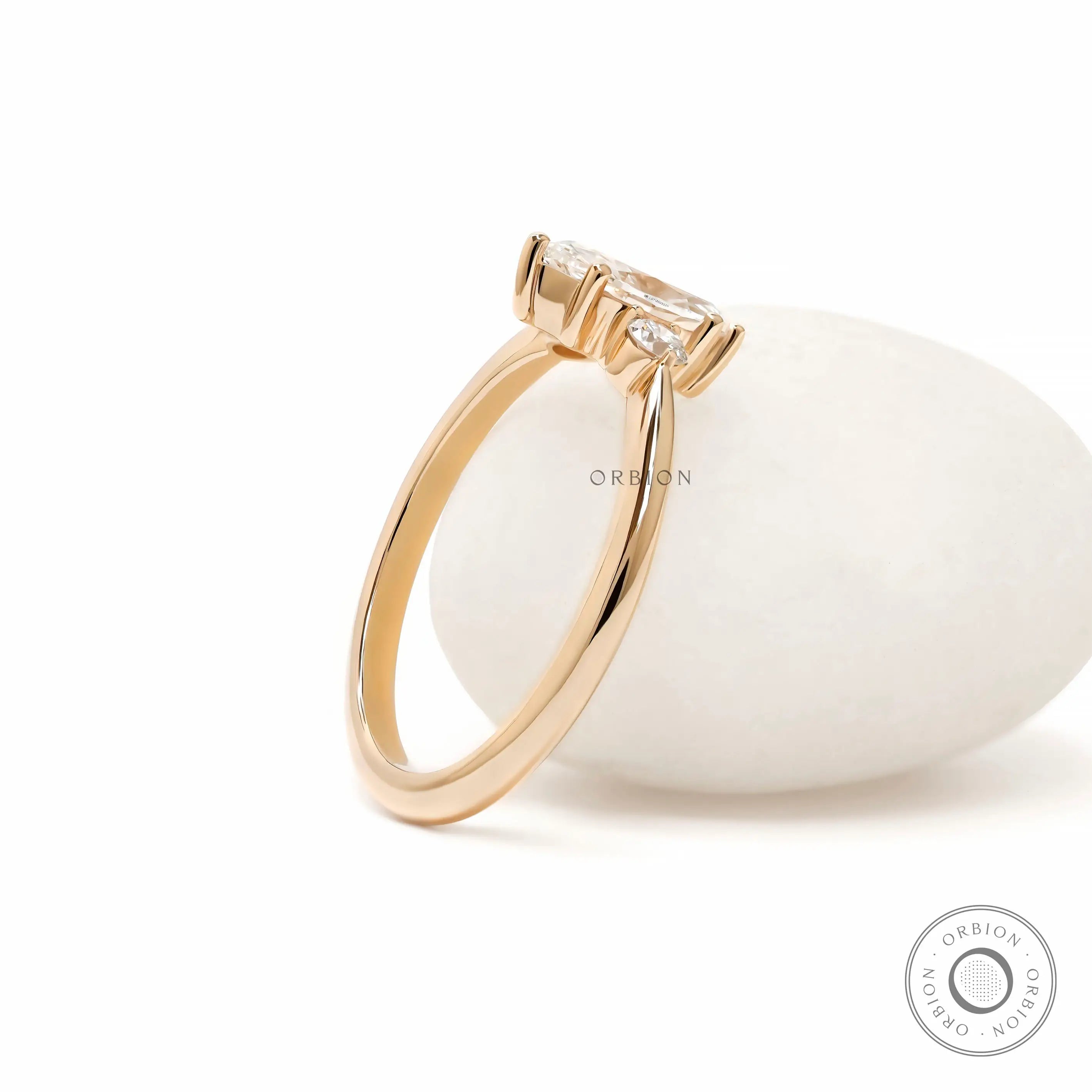 Marquise lab diamond three stone trilogy ring yellow gold